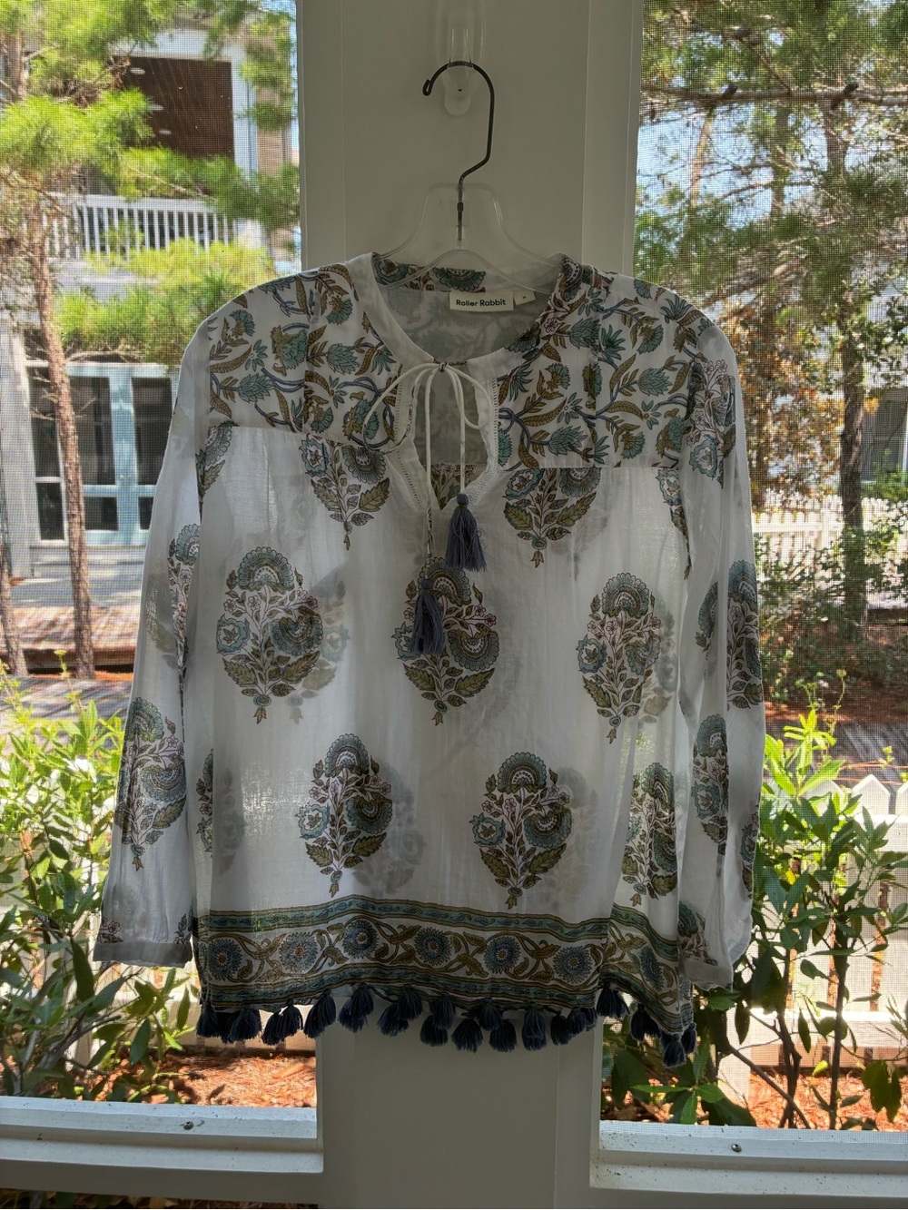 Boho. All cotton top with fringed bottom.